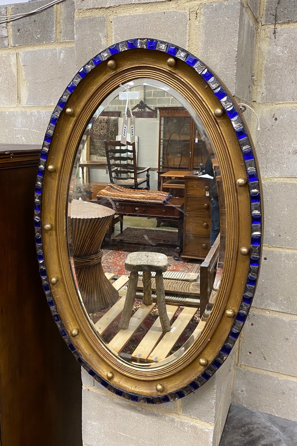 An Irish style oval wall mirror, width 64cm, height 100cm